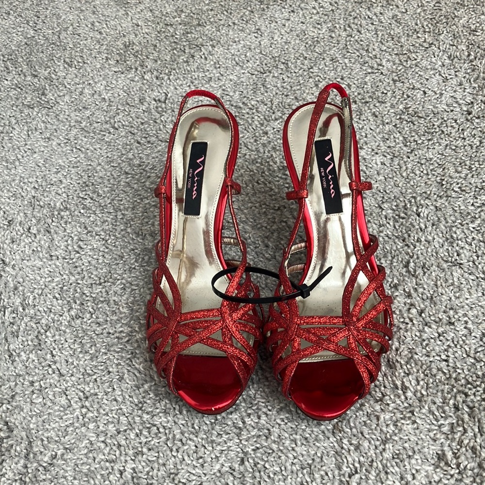 Like new red sparkly high heels.